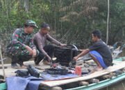 Kedekatan Satgas TMMD Kodim 1012/Buntok dengan Warga Terlihat Saat Bantu Perbaiki Mesin Perahu