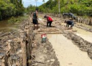 Perjuangan Satgas TMMD dan Warga Hadapi Medan Berlumpur dalam Pembukaan Jalan