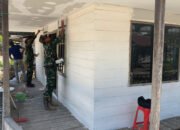 Satgas TMMD Lanjutkan Pengecatan Rehab Mushola Darul Mu’minin di Desa Talio