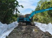 Satgas TMMD Kodim 1012/Buntok Lakukan Penimbunan Tanah di Desa Talio untuk Persiapan Pembangunan