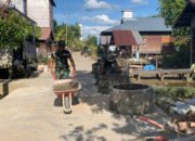 Satgas TMMD Gunakan ARCO untuk Angkut Adukan Semen di Desa Talio