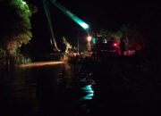 Satgas TMMD Kodim 1012/Buntok Kebut Pengerjaan Jalan di Desa Talio Saat Malam Hari