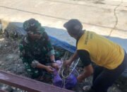 Satgas TMMD Kodim 1012/Buntok Bersama Warga Gelar Aksi Bersih Lingkungan