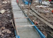 Satgas TMMD Kerahkan Seluruh Tenaga untuk Tuntaskan Pengecoran Jalan di Desa Talio